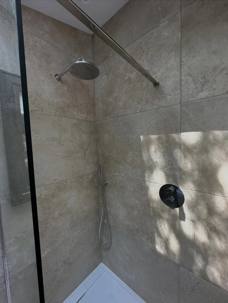 A shower fitted in a loft bathroom by Addisons