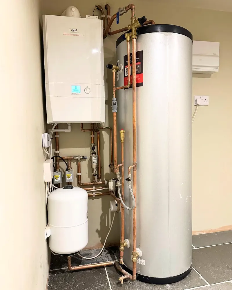 A system boiler and unvented cylinder with neat copper pipework
